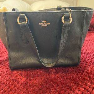 Two beautiful coach purses one black, one brown